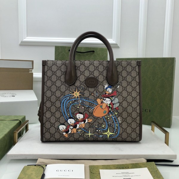 구찌 수프림 캔버스 디즈니 토트백 648134